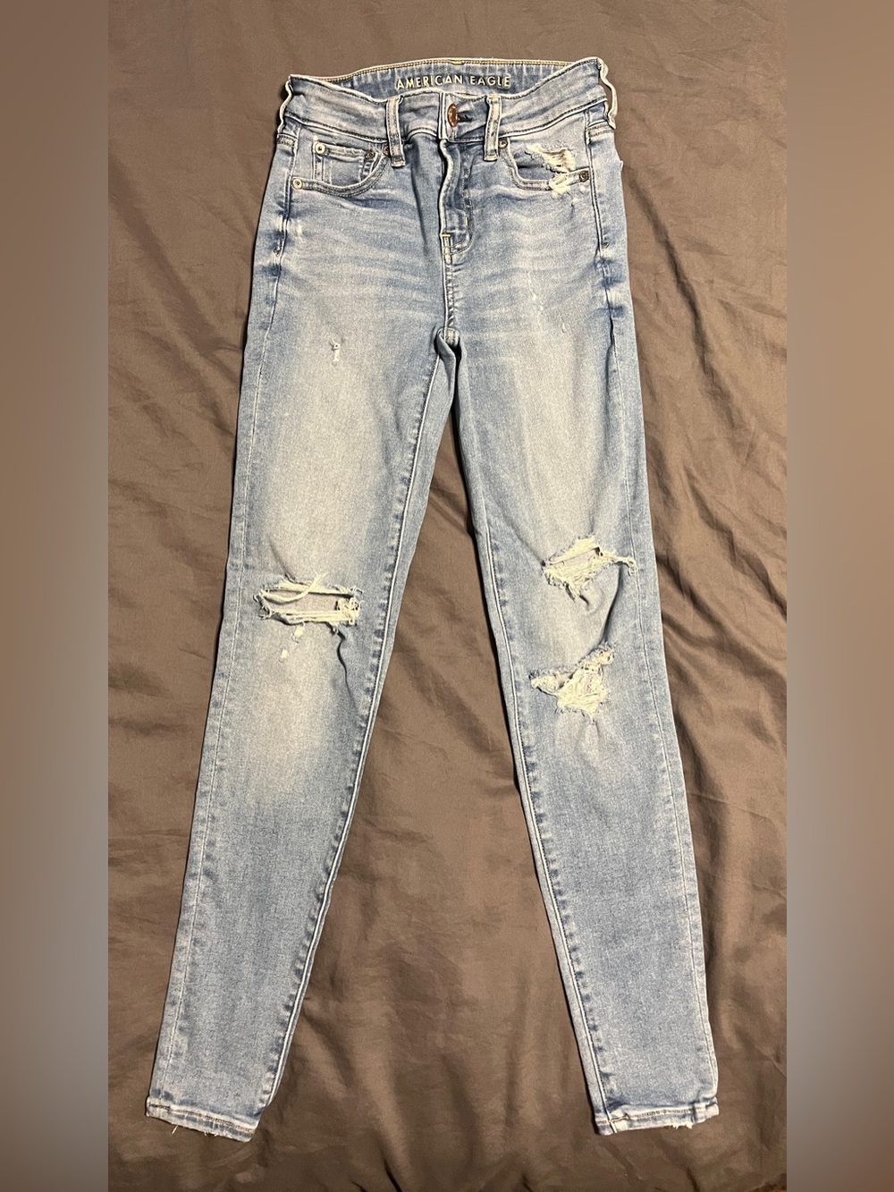American Eagle Outfitters Light Wash Distressed High-Rise Jeggings, size 0